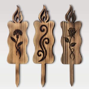 Lesena sveča na piku iz masivne smreke žgane barve - vsi motivi